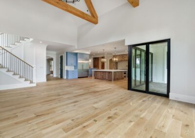 main open space showing kitchen, living room and stairs